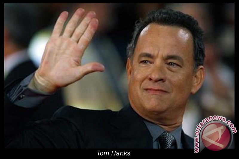 Tom Hanks akan produksi film indie soal JFK Tom Hanks akan produksi film indie soal JFK