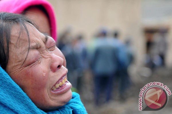 Ilustrasi korban <b>bencana alam</b> di China (REUTERS/China Daily) - 2012051411
