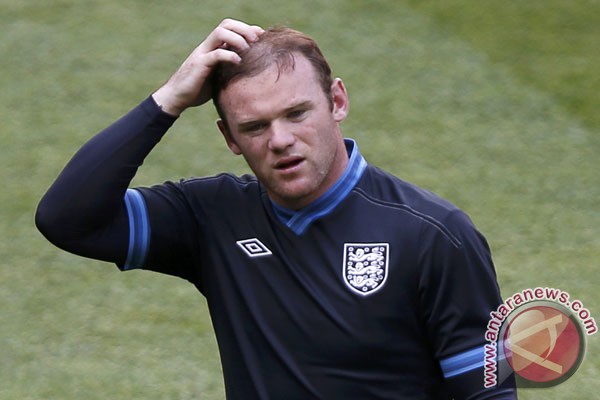 Rooney berperilaku santun, kata Hodgson Rooney berperilaku santun, kata Hodgson