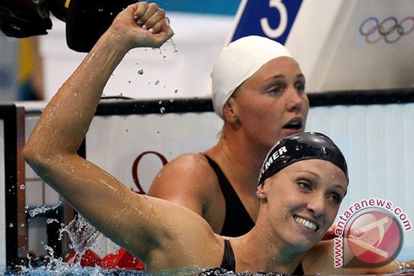 Dana Vollmer menangi emas, pecahkan rekor dunia Dana Vollmer menangi emas, pecahkan rekor dunia