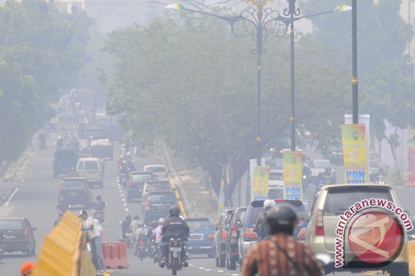 Wilayah Kota Palembang diselimuti kabut asap Wilayah Kota Palembang diselimuti kabut asap