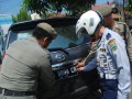Copot Plat Nomor
