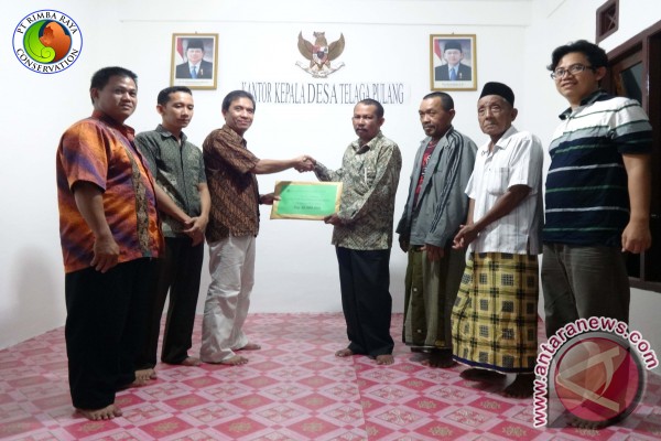 PT. Rimba Raya Conservation Hands Over the Community Development Funds to Four Villages in Seruyan Regency PT. Rimba Raya Conservation Hands Over the Community Development Funds to Four Villages in Seruyan Regency