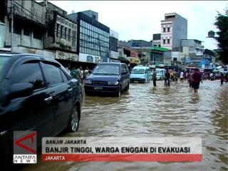 Banjir Tinggi, Warga Enggan Di Evakuasi
