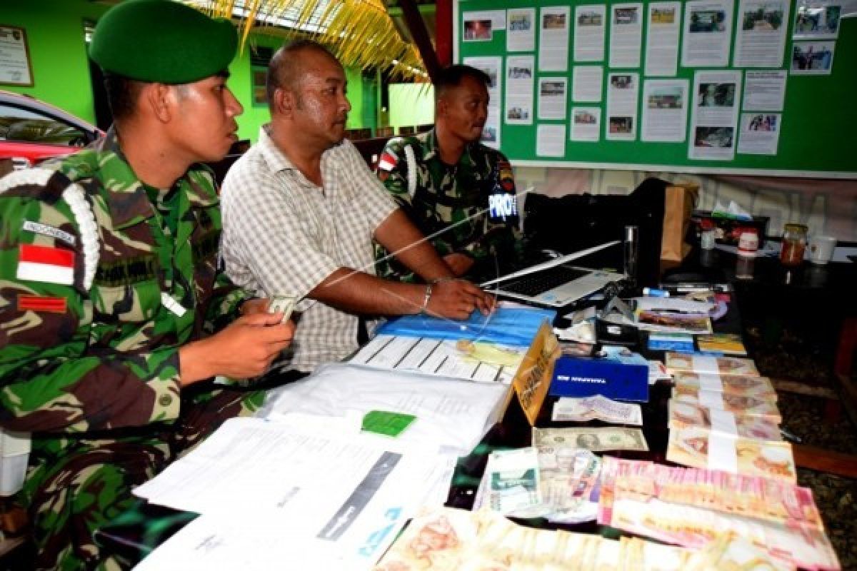 Pedagang di perbatasan RI-PNG harus jeli terima uang Kina 