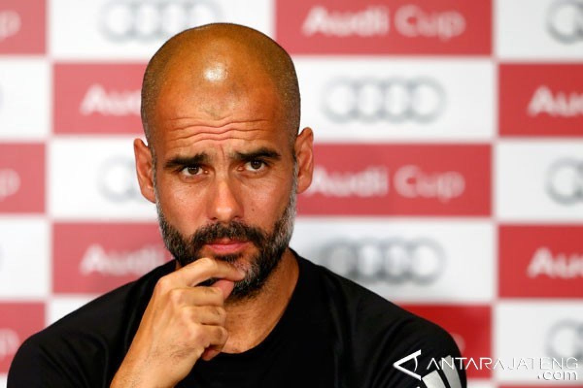 Guardiola Merendah, Terlalu Dini Samakan City dengan Barca