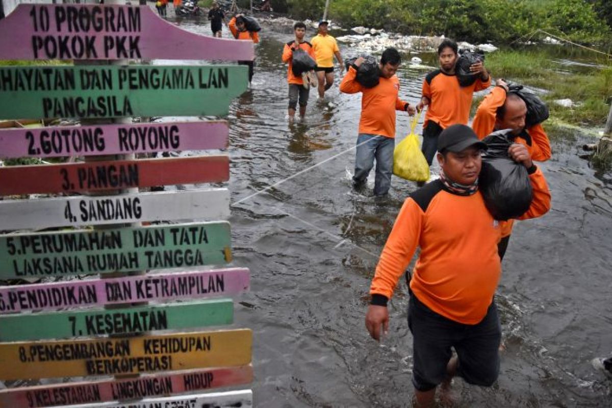 Penanganan dan pemulihan pascabanjir