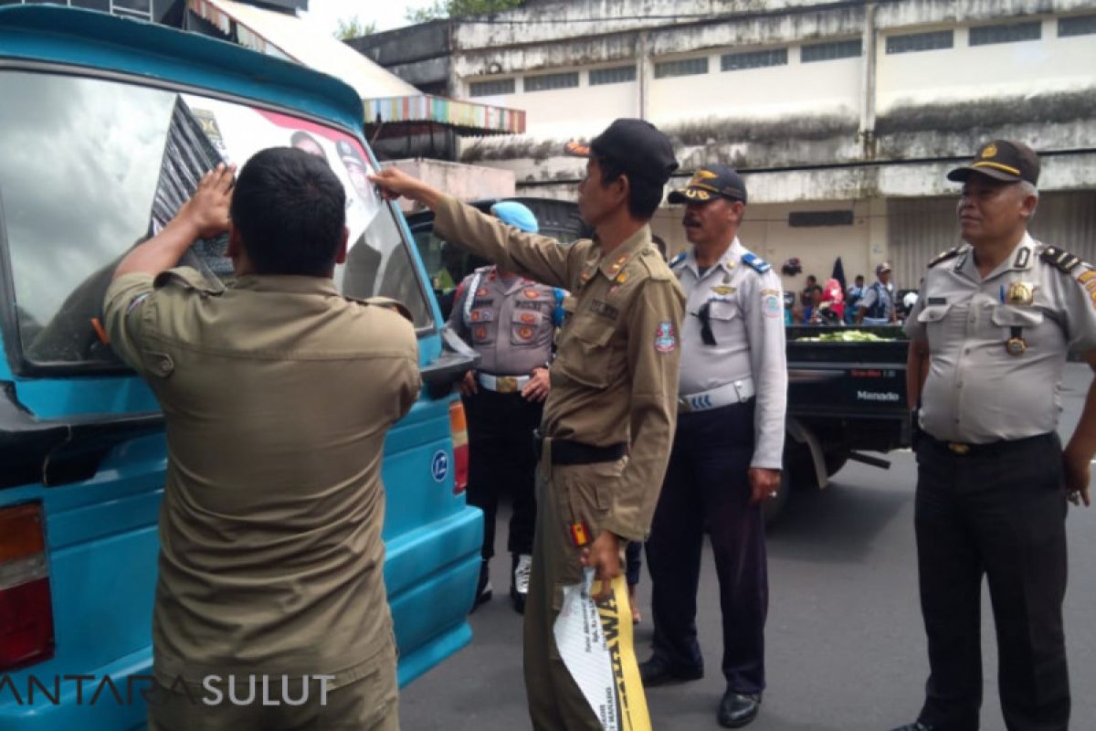 Bawaslu Manado kembali tertibkan branding sticker di Angkot