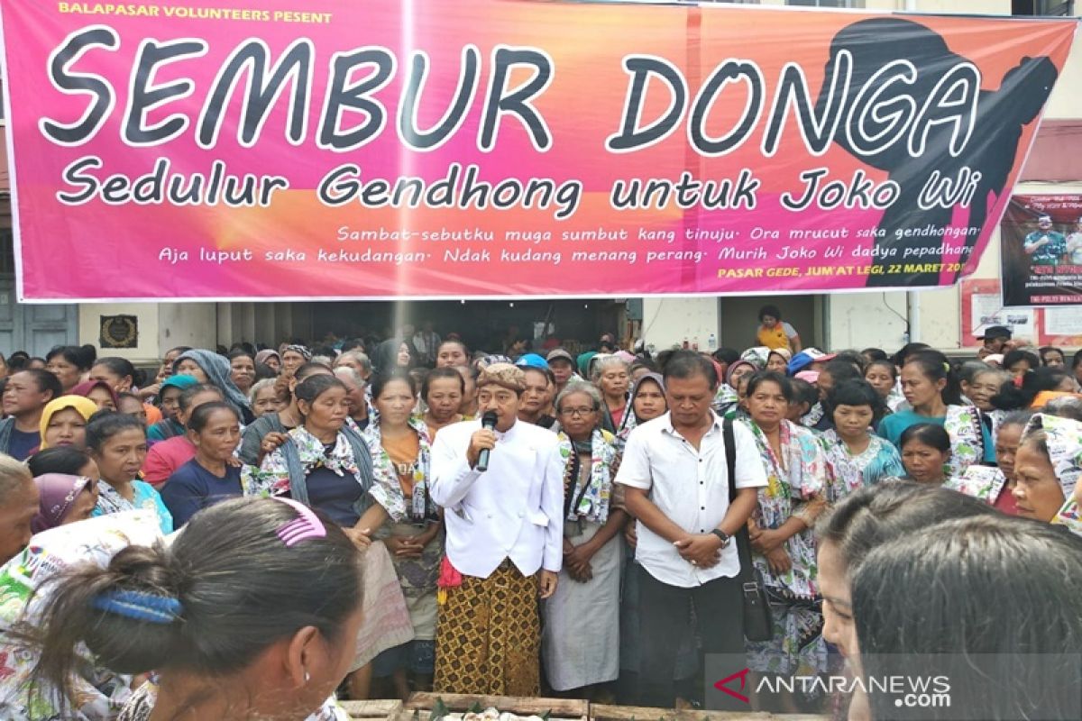 Buruh gendong doakan Jokowi menang