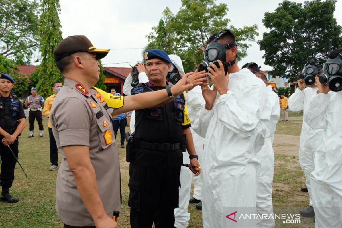 Mulai drone hingga watercanon, begini upaya polisi lawan COVID-19 di Riau