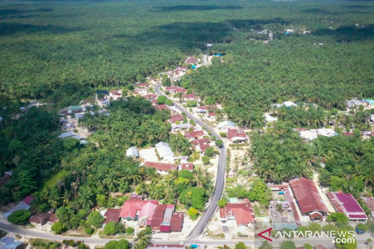 Puluhan tahun berselimut lumpur dan debu, kini Jalan Libo Jaya Kandis beraspal