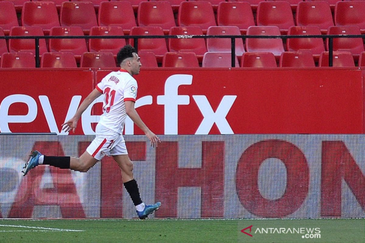 Munir El Haddadi antar Sevilla kalahkan Huesca 1-0