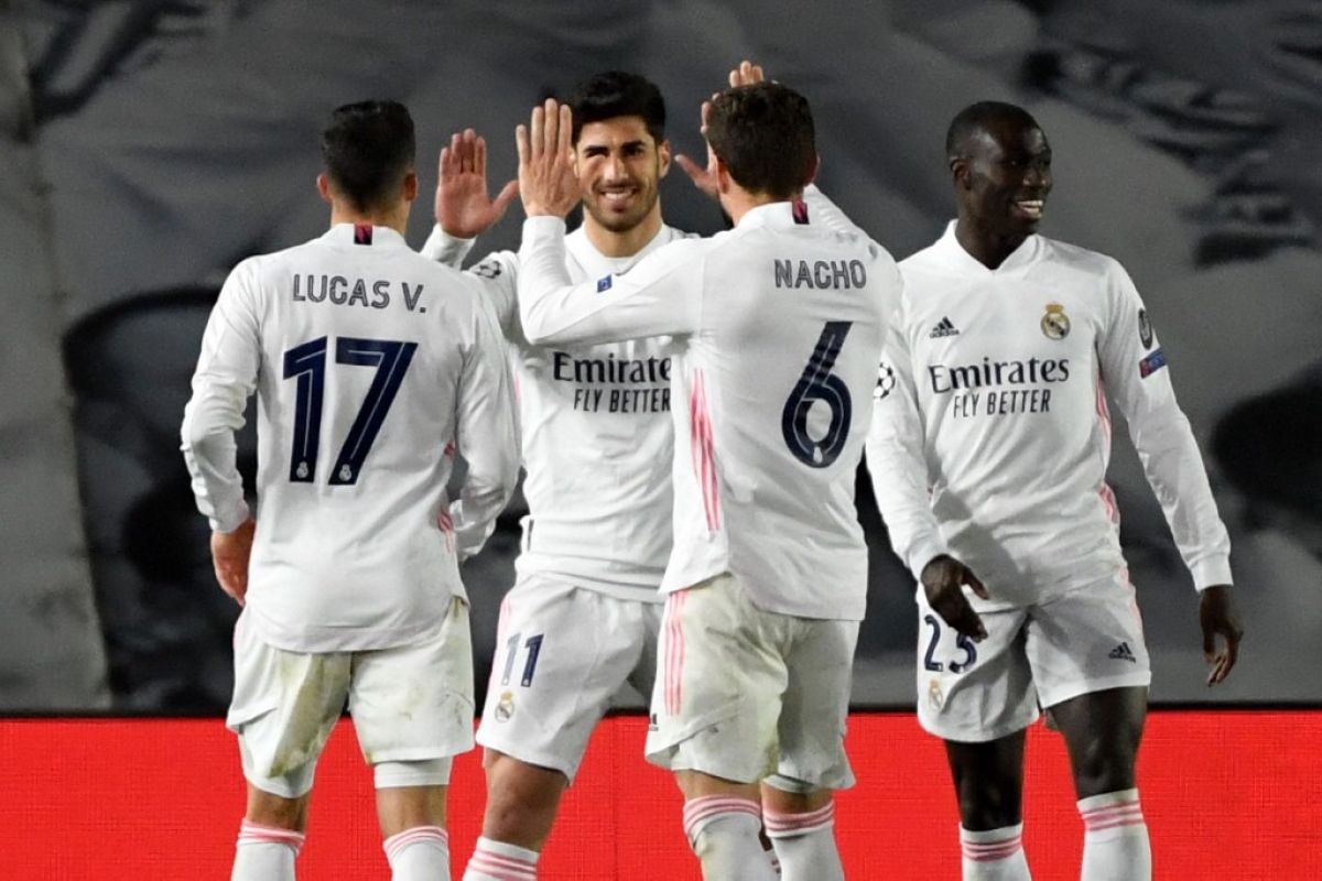 Tiga gol mengantarkan Real Madrid ke delapan besar Liga Champions