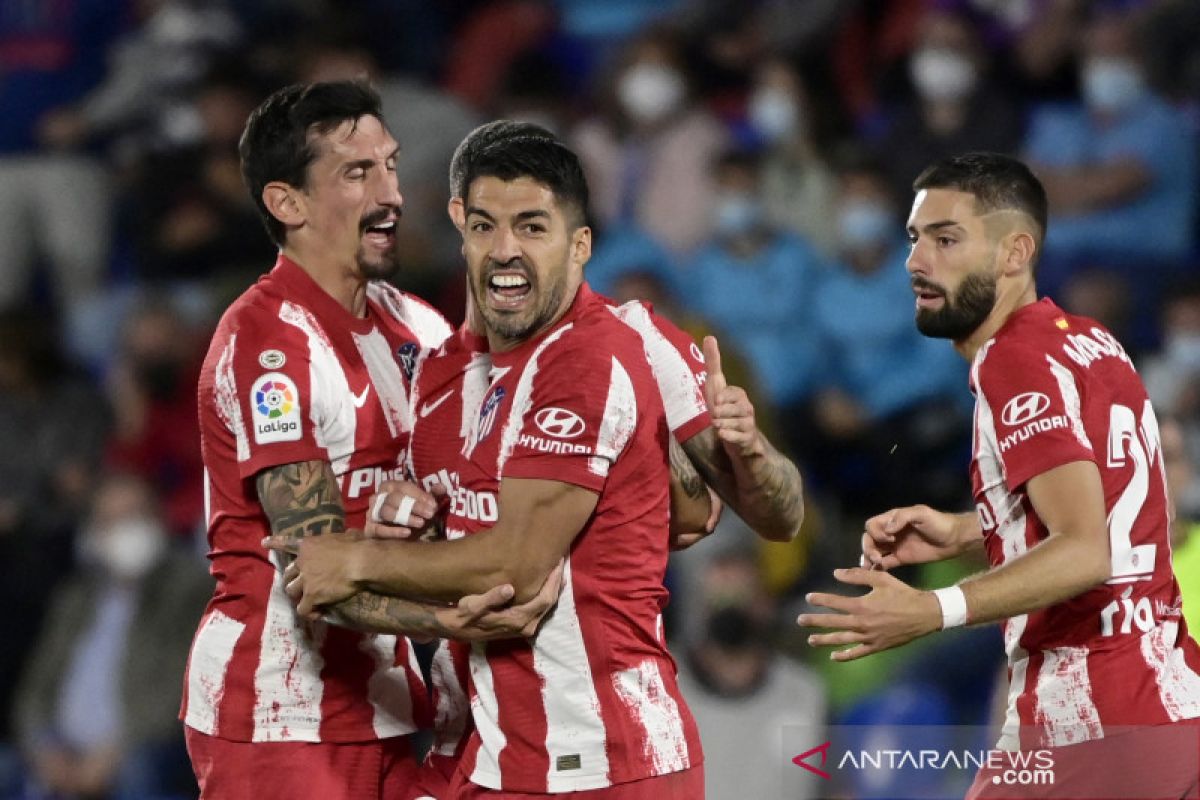 Atletico bekuk Getafe 2-1,  Suarez cetak dua gol