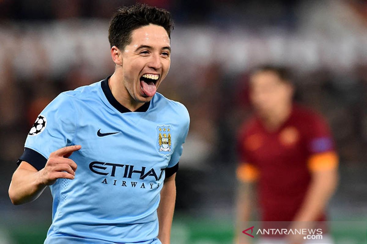 Eks gelandang Arsenal dan Man City, Nasri gantung sepatu