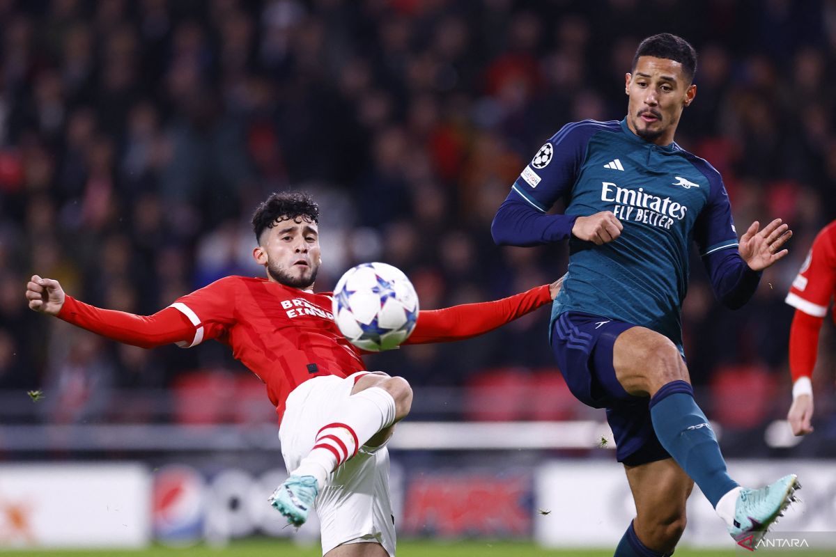 Arsenal dan PSV bermain imbang 1-1, keduanya lolos ke fase berikut