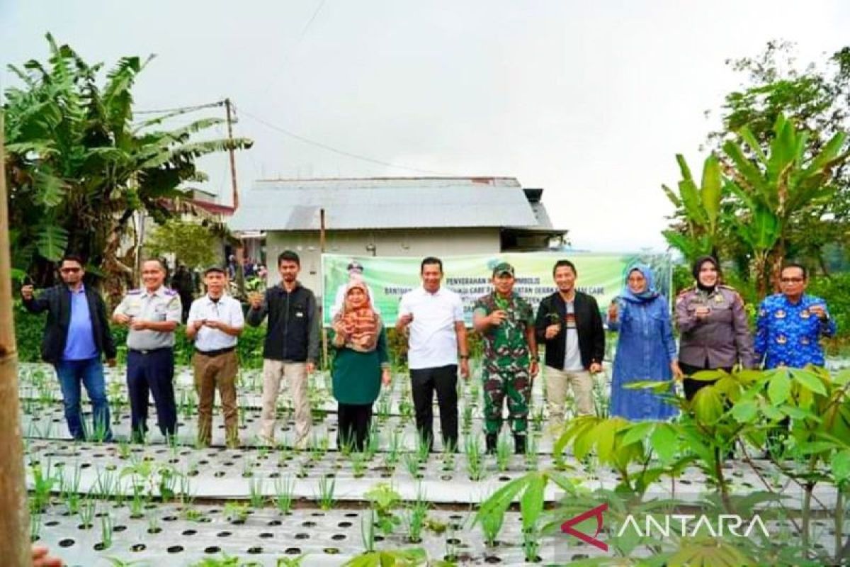 Pj. Wako Padang Panjang,  serahkan Bantuan P2L sukseskan GTC