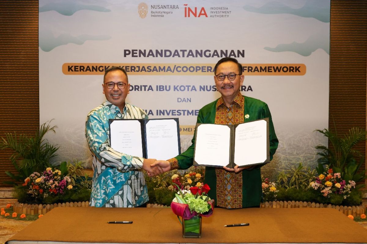 OIKN dan INA menjalin kolaborasi untuk menarik investasi asing di Ibu Kota Nusantara Kalimantan Timur. ANTARA/HO-OIKN Penandatanganan kerangka kerja sama dengan INA ini merupakan kelanjutan dari arahan Presiden agar INA dapat memfasilitasi Otorita IKN dalam merealisasikan investasi asing di IKNBali (ANTARA)