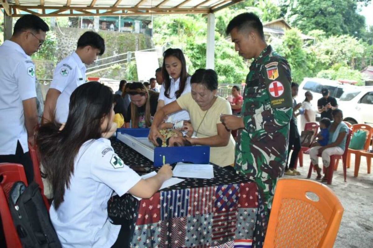 Satgas TMMD ke-121 Kodim Minahasa  gelar pelayanan kesehatan terpadu