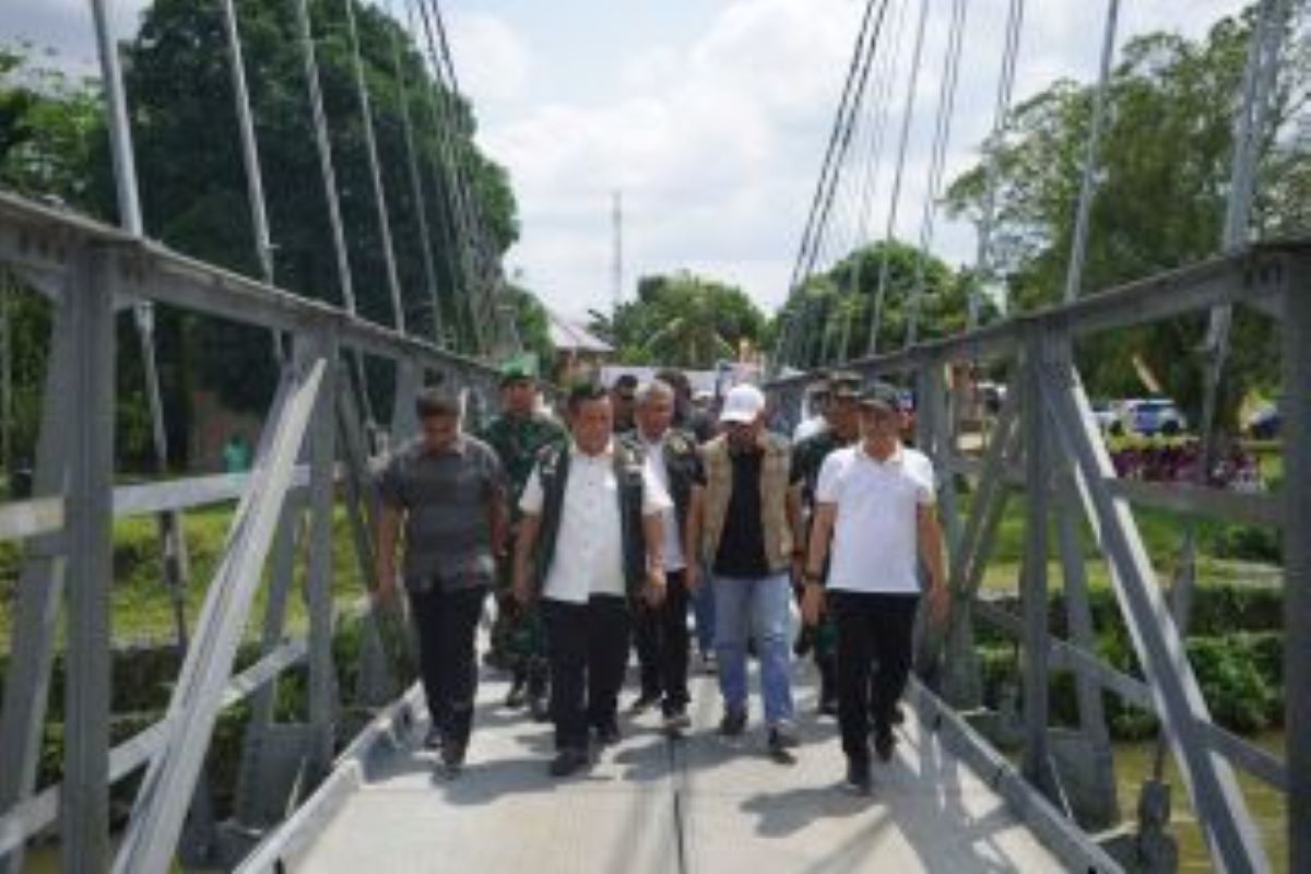 Pengerjaan fisik jembatan gantung Sepungguk, Desa Salo,  Kampar selesai