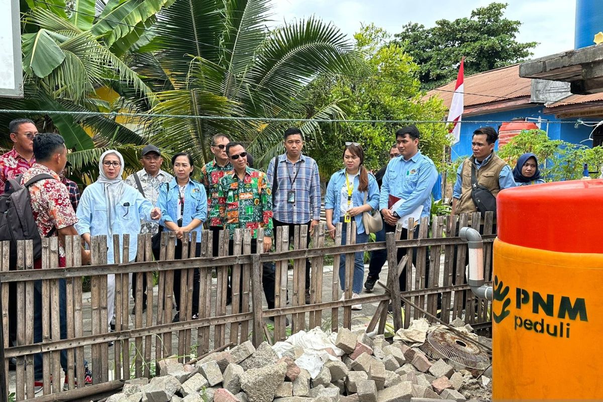 PNM dan BPN beri alat pengolahan sampah kepada warga Bunaken