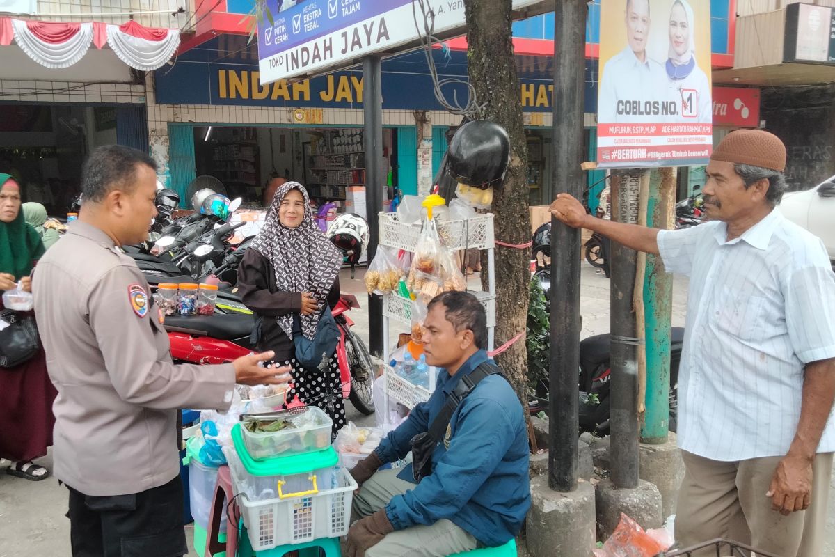 Bhabinkamtibmas Polsek Pekanbaru Kota imbau pedagang waspada segala kejahatan