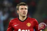 Gelandang MU Michael Carrick Akan Pensiun Akhir Musim