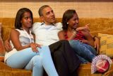  Obama punya cara unik cegah anak perempuannya bertato