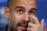 Manchester United dan Chelsea berebut dapatkan Guardiola