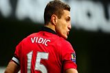  Mantan Kapten MU Vidic umumkan pensiun     