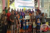 PLN Bagikan Buku Untuk Rumah Pintar Manado Peringati Hari Kartini