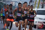 Maikel juara lari 10k Hari Juang Kartika