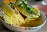 Mencicip gulai kepala kakap Pak Untung