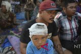 Kisah ketegaran korban gempa menghadapi dinginnya malam