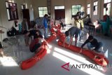 Mapala-Masyarakat Pusian Barat Bolmong kibarkan bendera raksasa