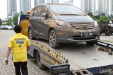 Strategi Adira terhadapnya lesunya industri otomotif