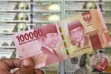 Trump's failed impeachment drives rupiah to rise