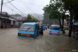 HUJAN DERAS SEJUMLAH TITIK DI MANADO BANJIR