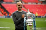 Raih tiga gelar, Guardiola tetap tagih peningkatan City musim depan