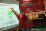 Finmas Edukasi Literasi-Inklusi Keuangan Kaum Milenial di Unsrat Manado