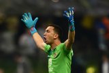 Marchesin isi posisi Casillas di Porto