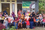 Tim Pengabdian Unbrah Bangun Bilik Tumbuh Kembang Balita di Pasaman Barat