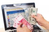 Rupiah Jumat pagi cenderung tertahan meski sentimen perang dagang membaik