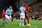 Liverpool memimpin delapan poin di puncak klasemen