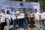 PLN Suluttenggo tanam ribuan pohon di lokasi wisata Mahawu peringati HMPI