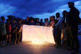 Warga Wamena nyalakan lilin peringati hari HAM internasional