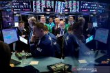 Wall Street melonjak karena stimulus China tenangkan kekhawatiran virus