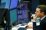Saham Inggris berakhir lebih rendah