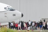 Sepulang dari karantina di Natuna
