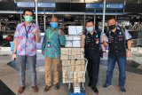 10.000 sarung tangan latex dikirim dari Kuala Lumpur